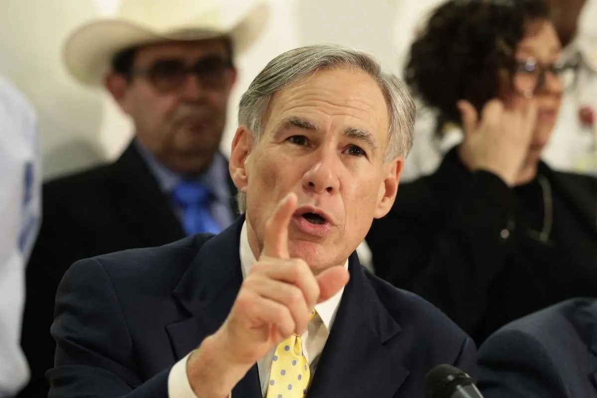 FILE - In this March 16, 2020, file photo, Texas Gov. Greg Abbott is joined by state and city officials as he gives an update on the coronavirus outbreak in San Antonio. Abortion clinics in Texas filed an emergency motion Saturday, April 11, 2020, asking the Supreme Court to overturn a lower-court order and allow abortions when they can be... Photo: Eric Gay, STF / Associated Press