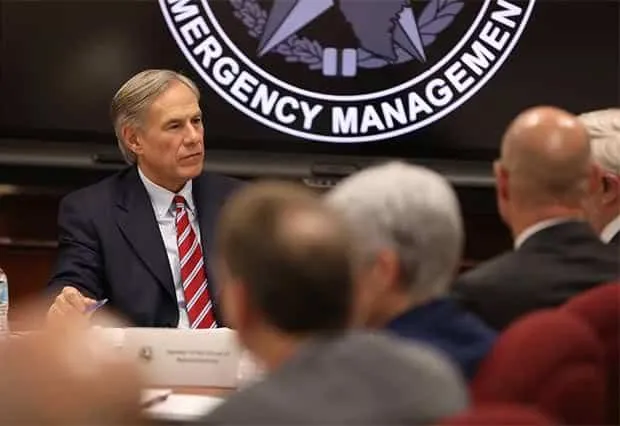 Governor Greg Abbott is briefed on the state of coronavirus outbreak in Texas. -- Miguel Gutierrez Jr. | The Texas Tribune