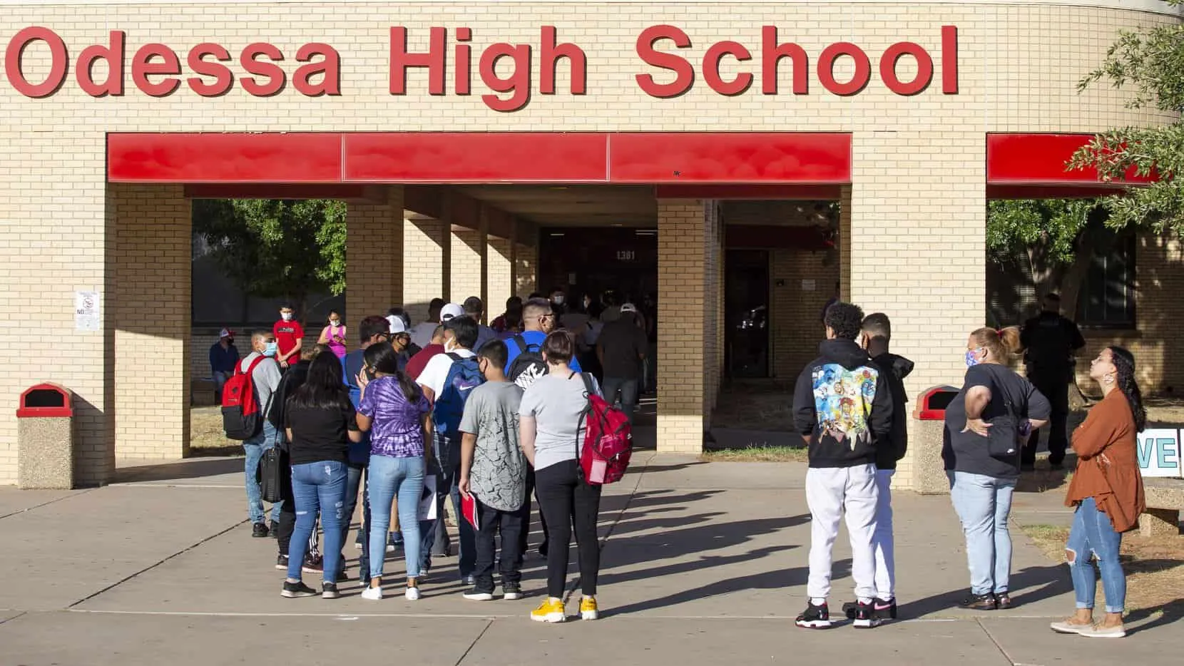 Students at Odessa High School line up outside as they wait to enter the school Wednesday morning Aug. 12, 2020 during the first day of the school year in Odessa Texas.(Ben Powell)