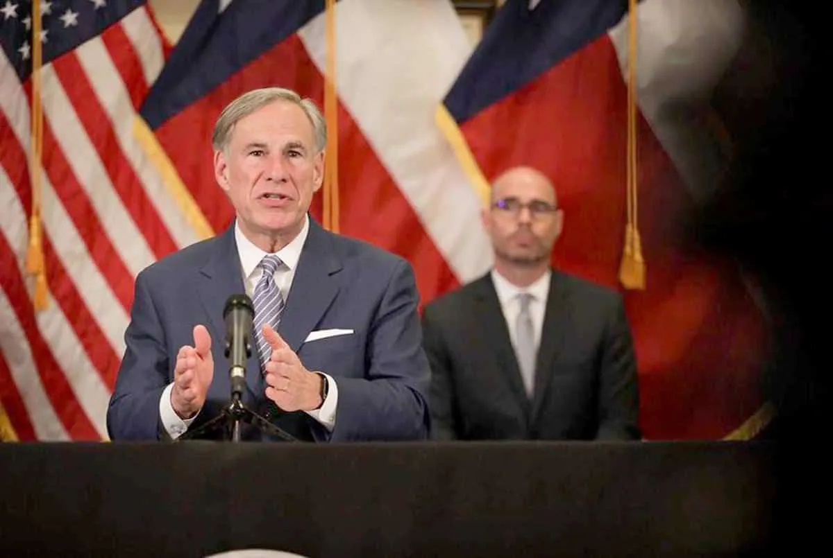 Gov. Greg Abbott lays out the initial steps for restarting the state economy during a news conference Friday as House Speaker Dennis Bonnen, R-Angleton, looks on in the background. Miguel Gutierrez Jr./The Texas Tribune