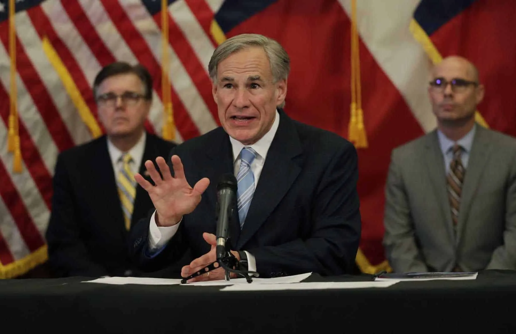 Texas Gov. Greg Abbott, center, with Lt. Gov. Dan Patrick, left, and Texas House Speaker Dennis Bonnen, right, speaks during an April news conference about the state’s response to the COVID-19 pandemic. Photo: Eric Gay /Associated Press