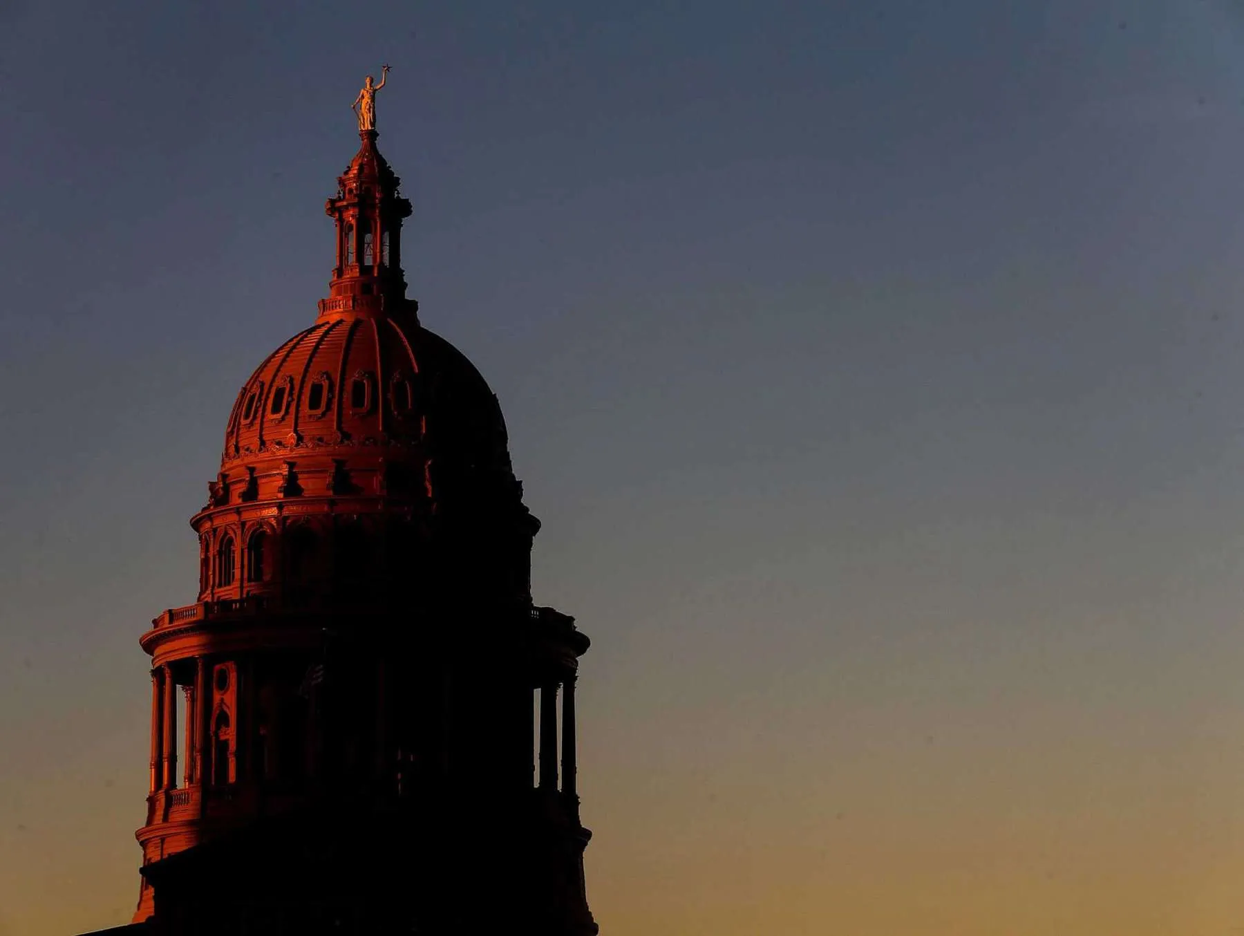 The sun sets over the Texas Capitol Tuesday, Oct. 11, 2016, in Austin. ( Jon Shapley / Houston Chronicle ) Jon Shapley, Staff / Houston Chronicle