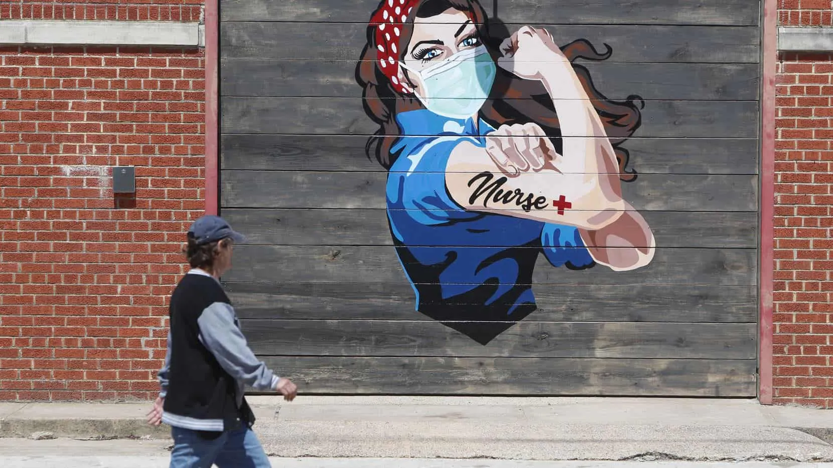 A mural near a hospital pays tribute to nurses during the COVID-19 outbreak in Dallas, Wednesday, April 15, 2020. (AP Photo/LM Otero)(LM Otero)