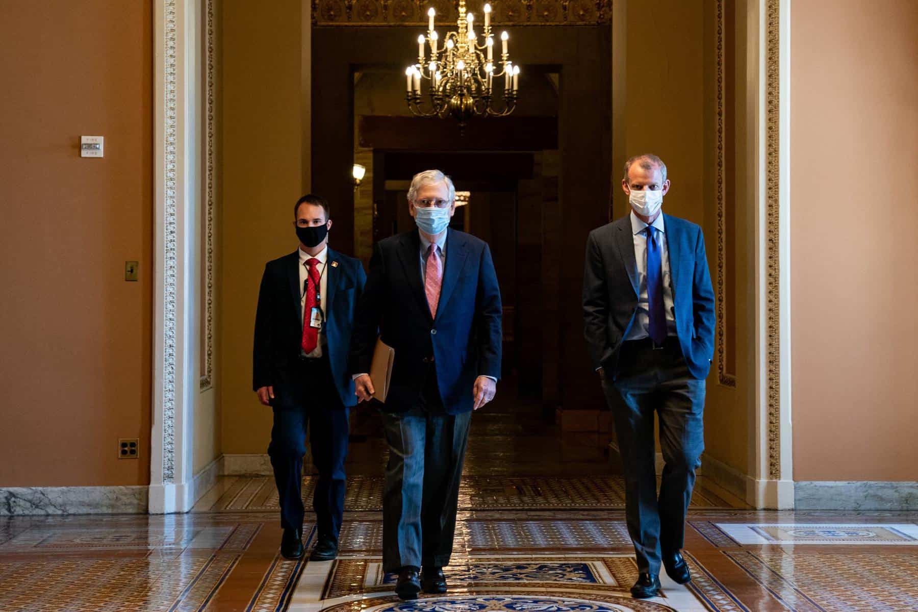 “Wearing simple face coverings is not about protecting ourselves, it is about protecting everyone we encounter,” Mitch McConnell, the Senate majority leader, said this week.Credit...Anna Moneymaker/The New York Times