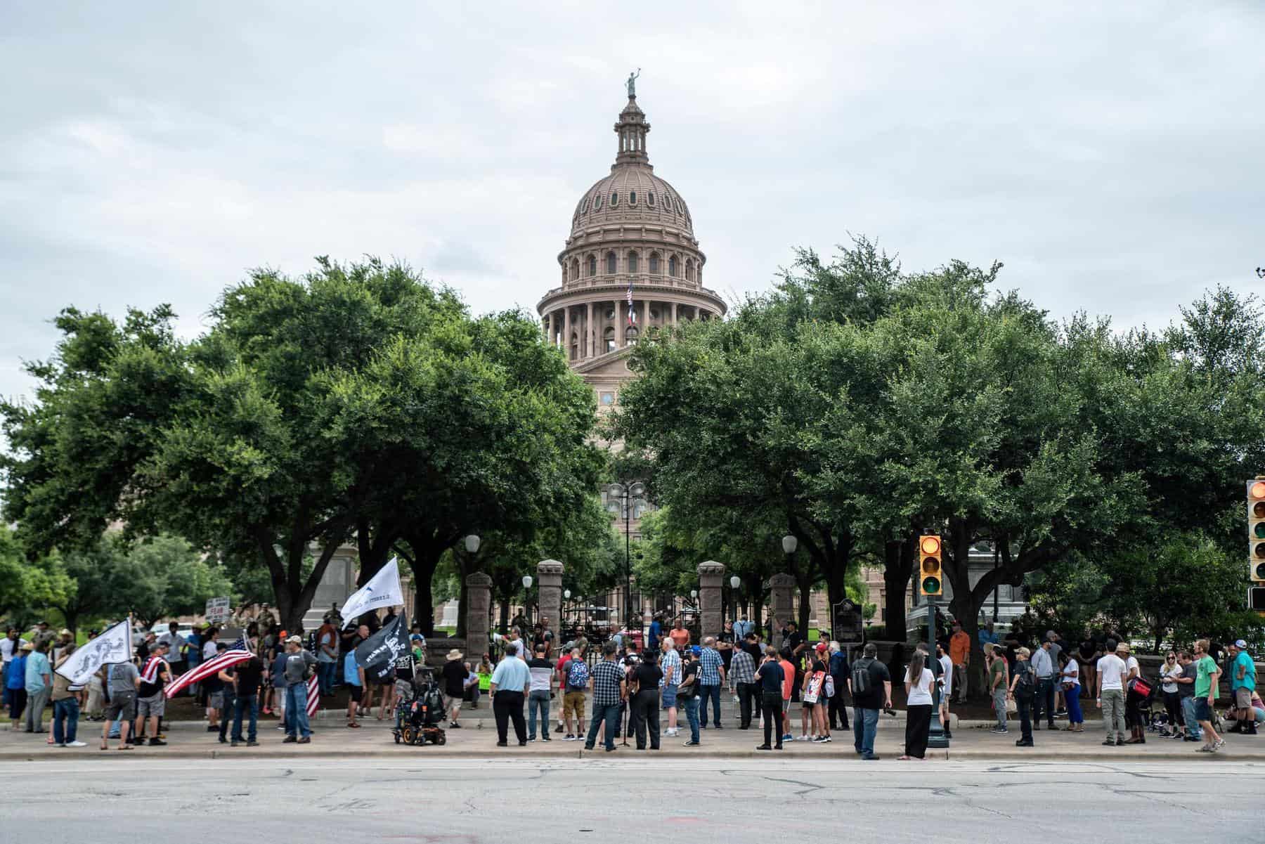 Demonstrators in Austin, Texas, protested against mandates to wear masks amid the coronavirus pandemic on Sunday.Credit...Sergio Flores/Reuters